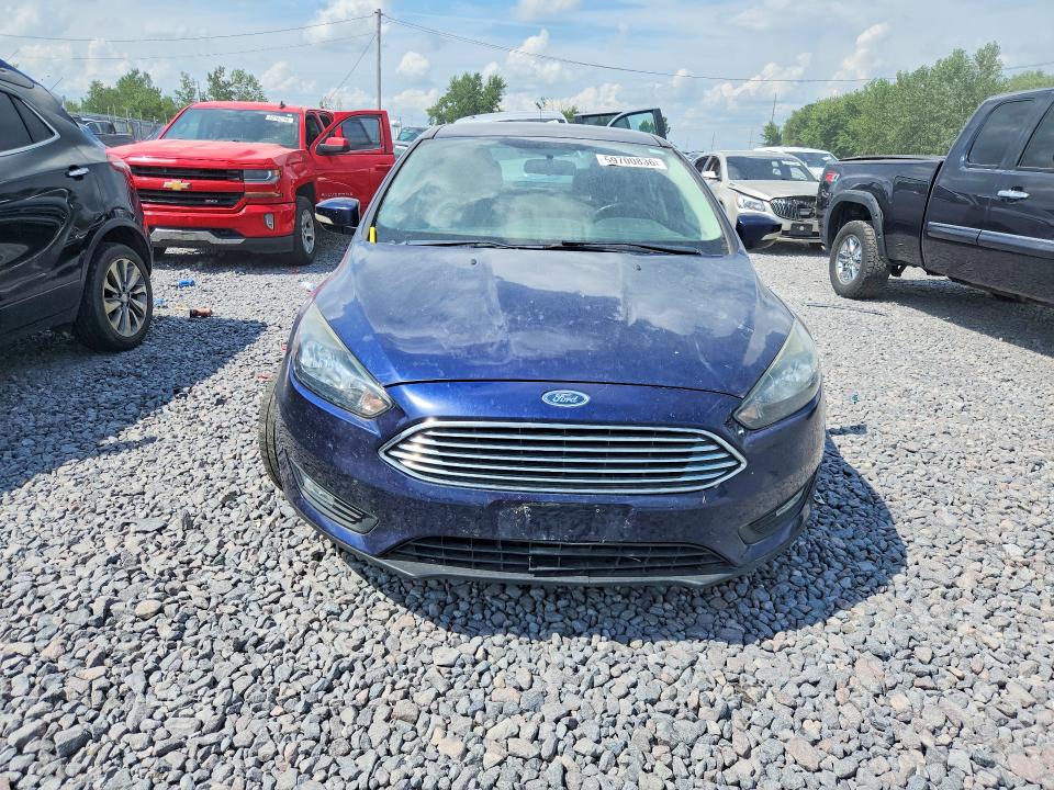 Photo 5 from auction – 2016 FORD FOCUS with VIN 1FADP3F27GL291571