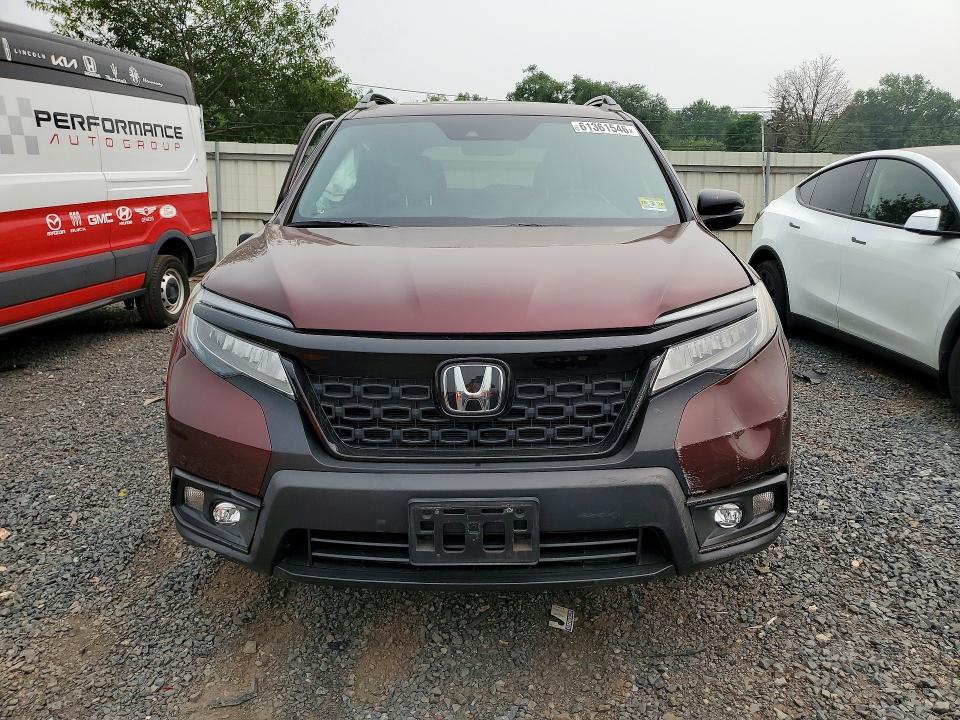 Photo 5 from auction – 2021 HONDA PASSPORT with VIN 5FNYF8H99MB013405