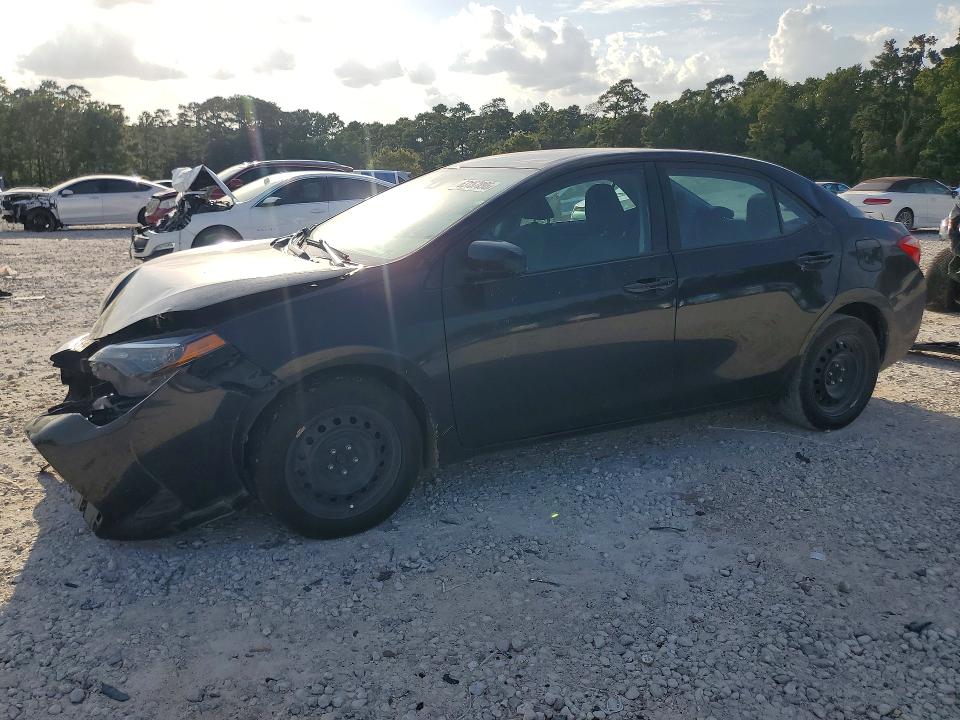 TOYOTA COROLLA 2019 with VIN 5YFBURHE4KP879903 - Photo from auction