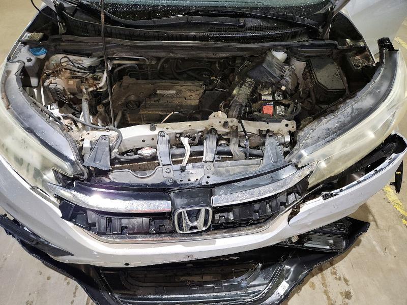 Photo 12 from auction – 2016 HONDA CR-V with VIN 2HKRM3H33GH545411