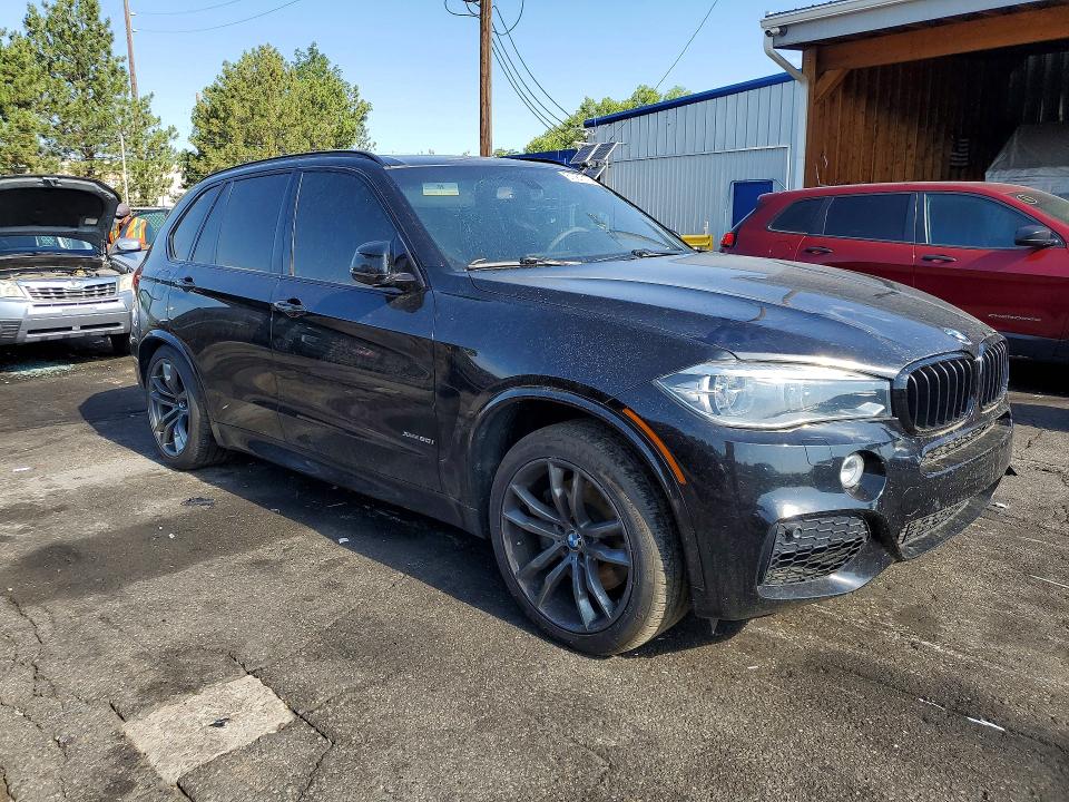 Photo 4 from auction – 2014 BMW X5 with VIN 5UXKR6C5XE0J73569