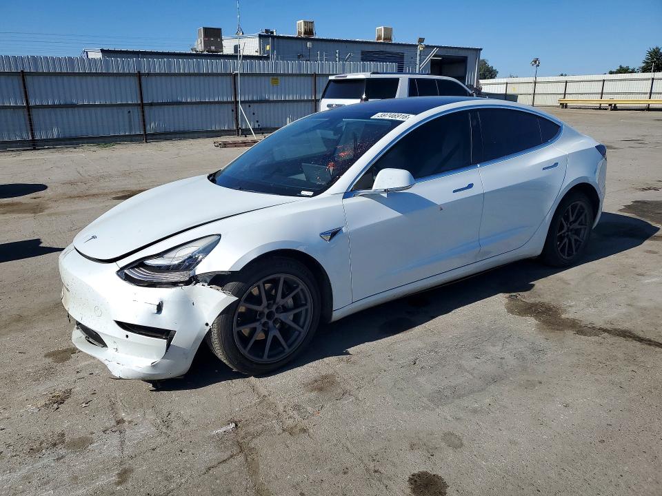 TESLA MODEL 3 2018 with VIN 5YJ3E1EA9JF166154 - Photo from auction