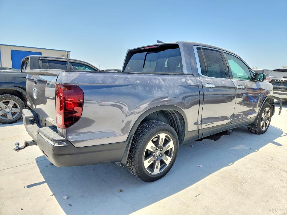 Photo 3 from auction – 2017 HONDA RIDGELINE with VIN 5FPYK3F79HB003275