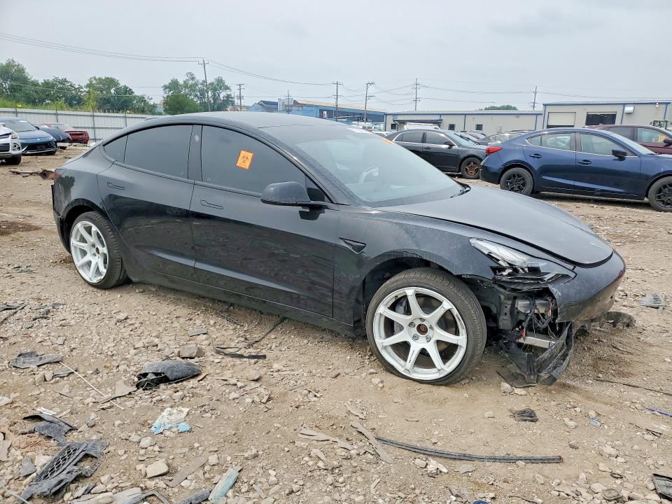 Photo 4 from auction – 2022 TESLA MODEL 3 with VIN 5YJ3E1EBXNF127149