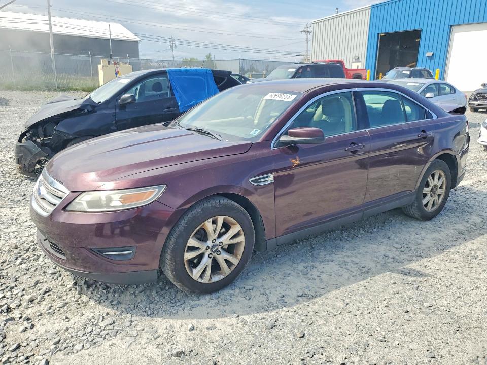 FORD TAURUS 2011 with VIN 1FAHP2HW2BG181444 - Photo from auction