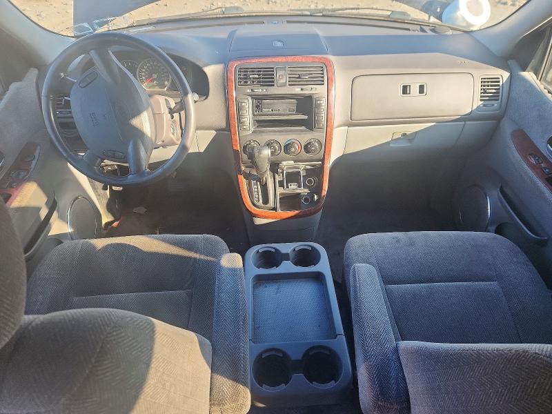 Photo 8 from auction – 2003 KIA SEDONA with VIN KNDUP131436345749