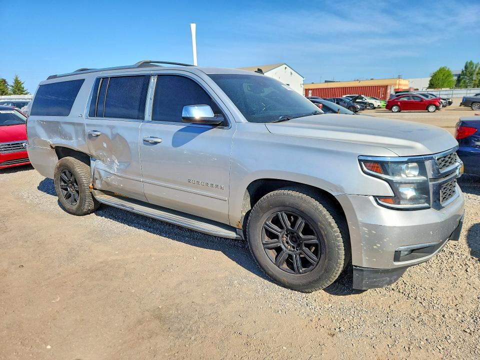 Photo 4 from auction – 2015 CHEVROLET SUBURBAN with VIN 1GNSKKKC4FR211655