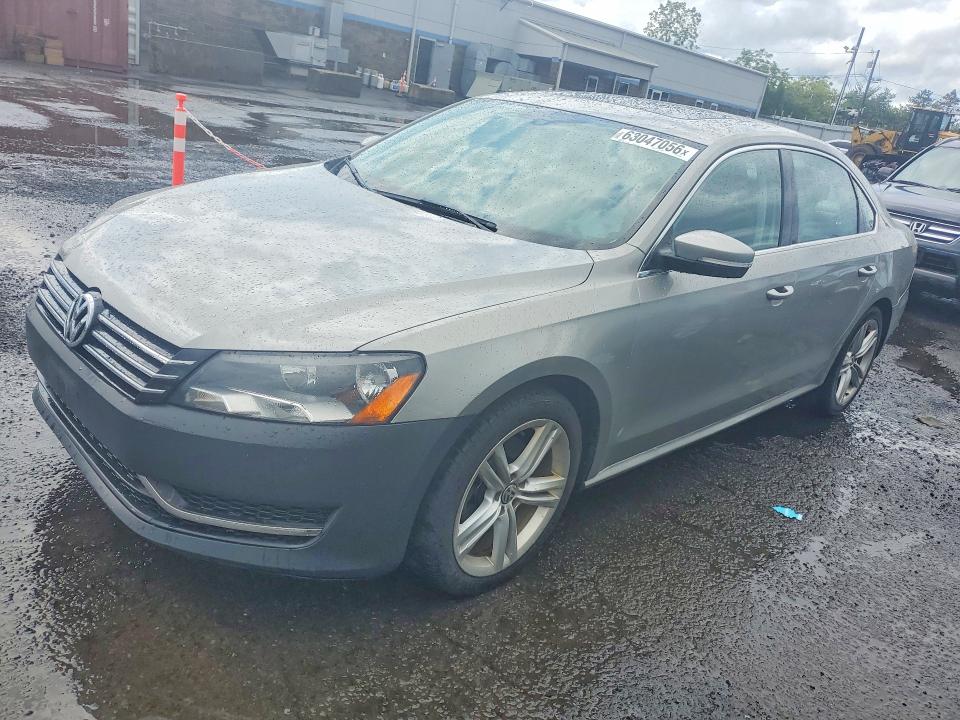 VOLKSWAGEN PASSAT 2014 with VIN 1VWBT7A35EC070582 - Photo from auction