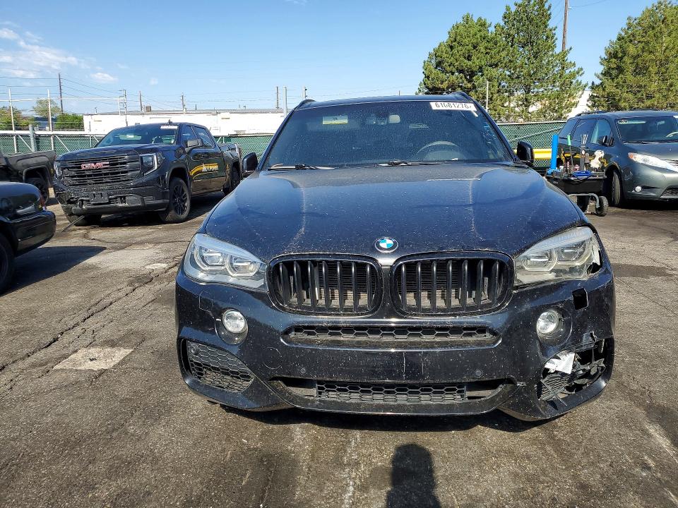Photo 5 from auction – 2014 BMW X5 with VIN 5UXKR6C5XE0J73569