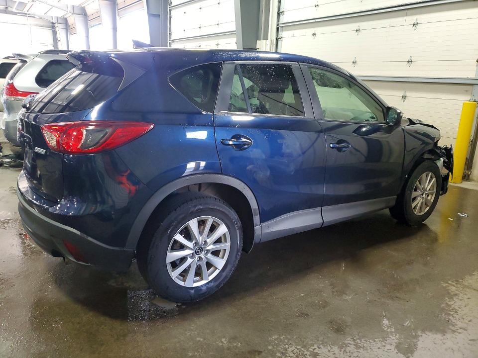 Photo 3 from auction – 2016 MAZDA CX-5 with VIN JM3KE4CYXG0602649