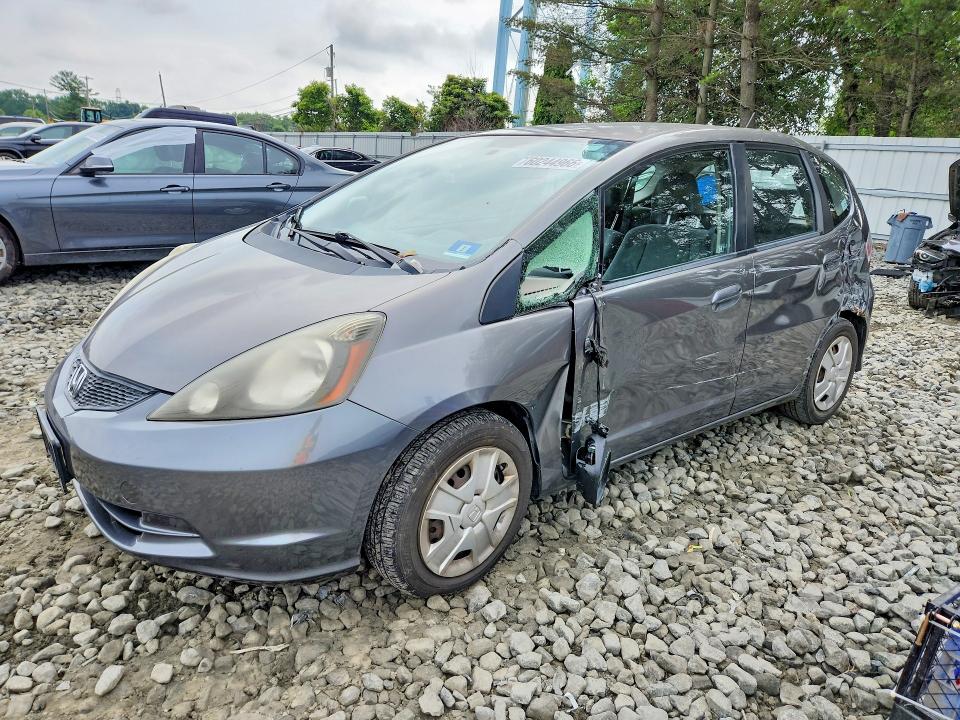 HONDA FIT 2013 with VIN JHMGE8H36DC077973 - Photo from auction
