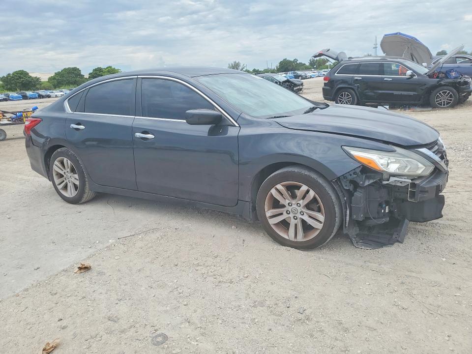 Photo 4 from auction – 2016 NISSAN ALTIMA with VIN 1N4AL3AP9GC179873
