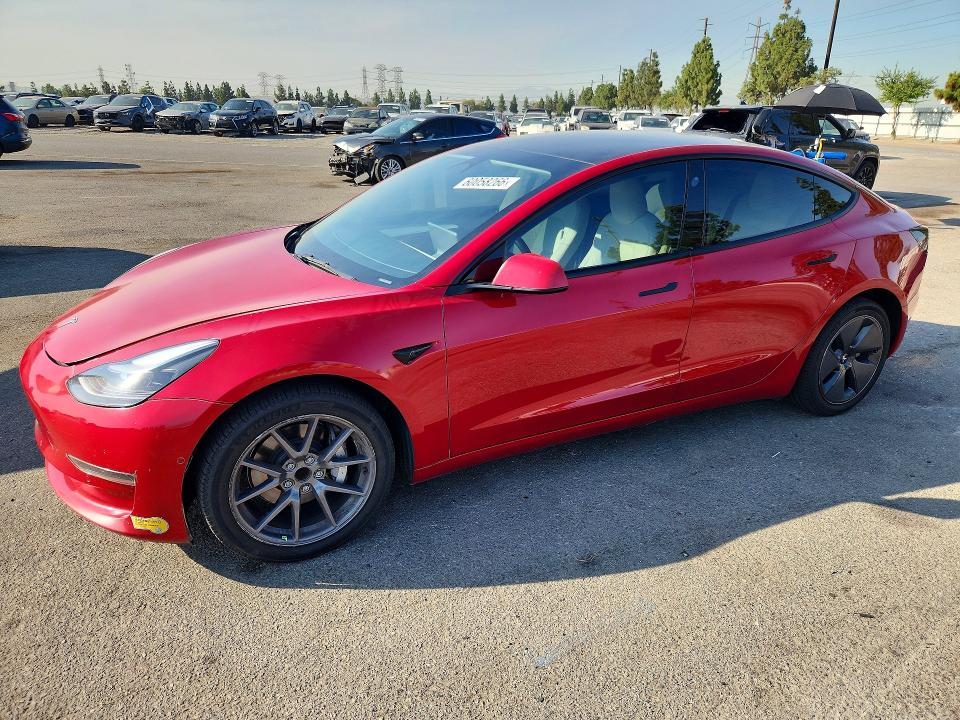 TESLA MODEL 3 2022 with VIN 5YJ3E1EA3NF355887 - Photo from auction