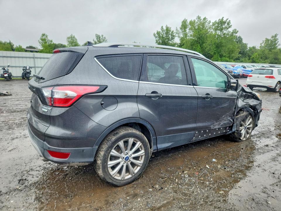 Photo 3 from auction – 2018 FORD ESCAPE with VIN 1FMCU0J94JUA44300