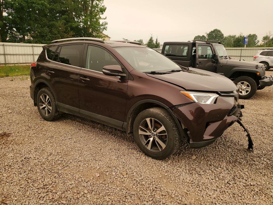 Photo 4 from auction – 2018 TOYOTA RAV4 with VIN 2T3RFREV0JW819473