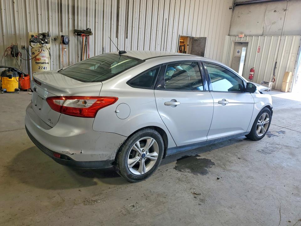 Photo 3 from auction – 2014 FORD FOCUS with VIN 1FADP3F25EL321986