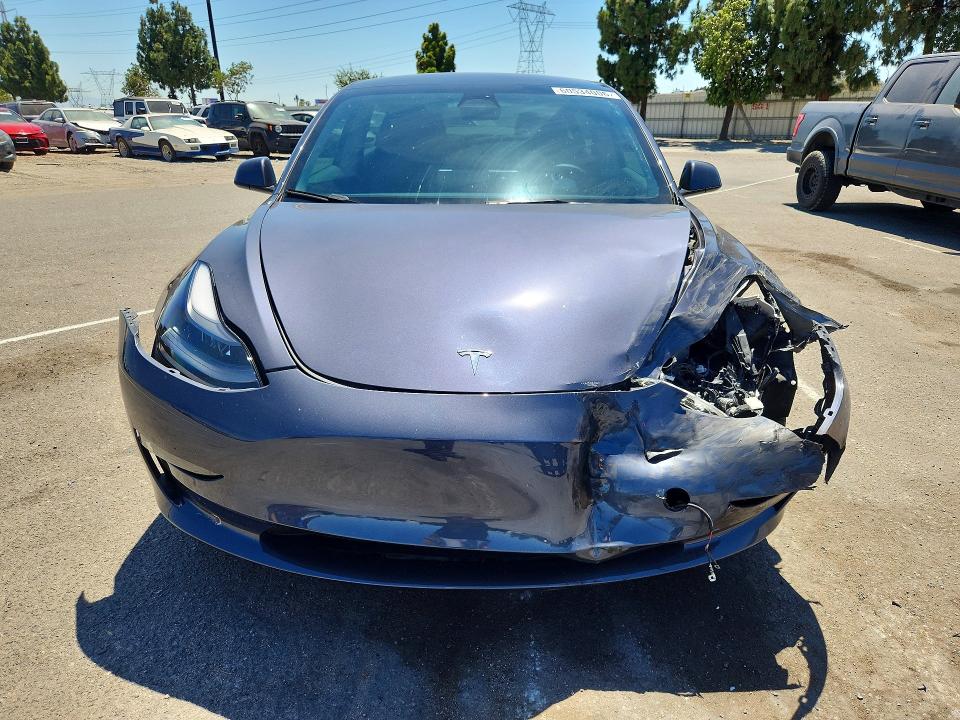 Photo 5 from auction – 2023 TESLA MODEL 3 with VIN 5YJ3E1EA6PF502013