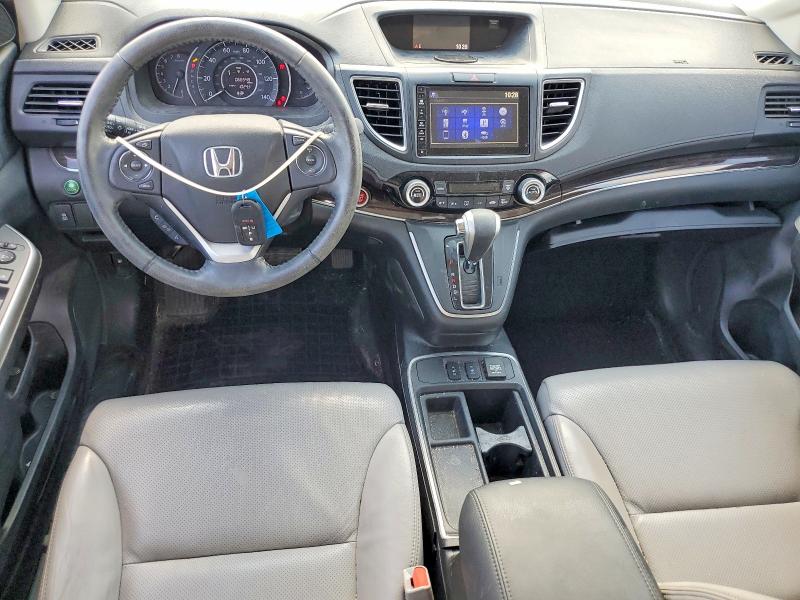 Photo 8 from auction – 2016 HONDA CR-V with VIN 5J6RM3H79GL021124