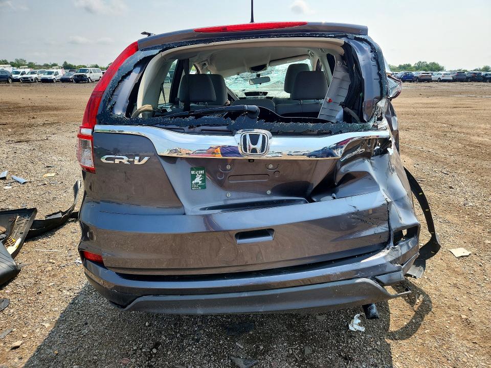 Photo 6 from auction – 2016 HONDA CR-V with VIN 5J6RM4H38GL001563