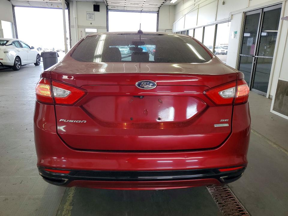 Foto 6 de la subasta – 2016 FORD FUSION con VIN 3FA6P0H92GR356622