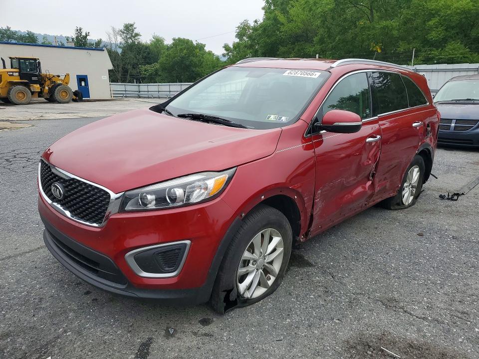 KIA SORENTO 2016 with VIN 5XYPG4A31GG075238 - Photo from auction