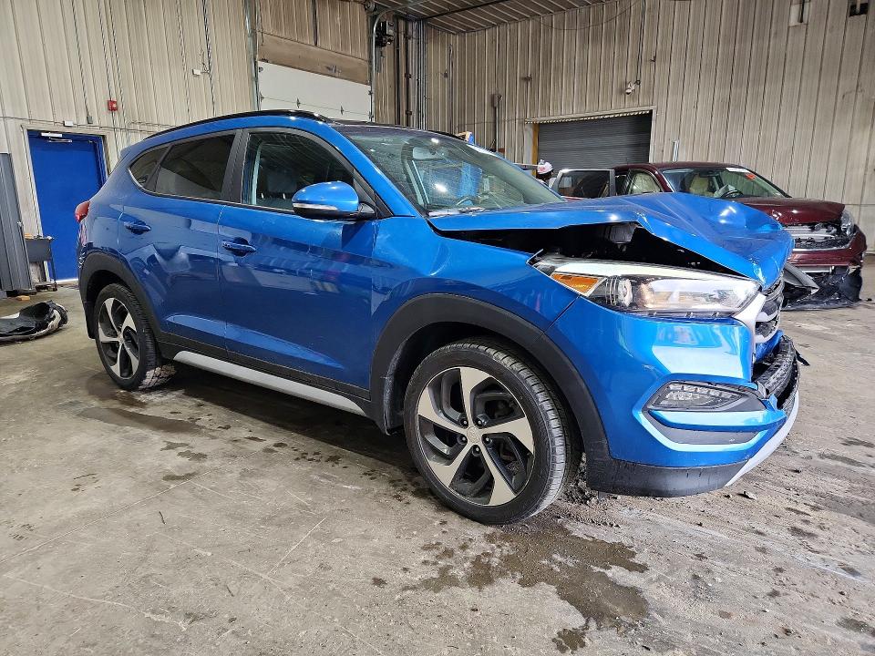 Photo 4 from auction – 2018 HYUNDAI TUCSON with VIN KM8J3CA28JU833516
