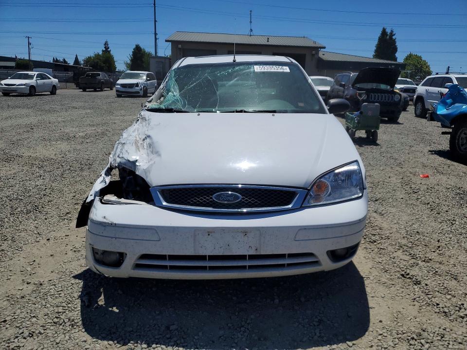 Photo 5 from auction – 2015 FORD FOCUS with VIN 1FAFP34N95W278807