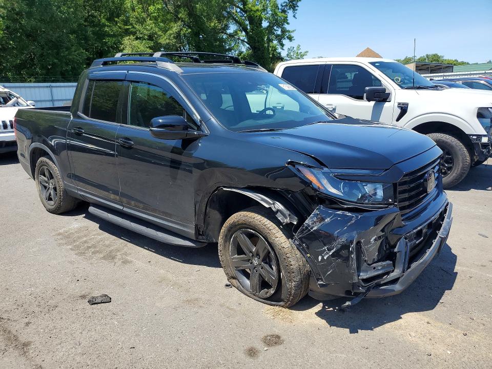 Photo 4 from auction – 2023 HONDA RIDGELINE with VIN 5FPYK3F88PB021581