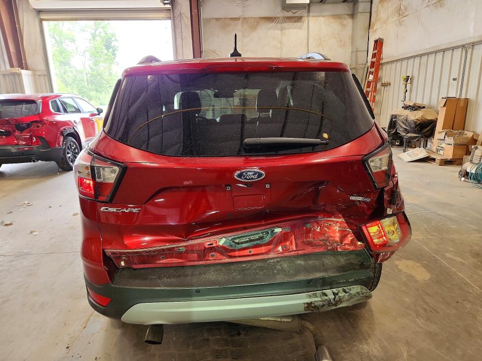 Photo 6 from auction – 2018 FORD ESCAPE with VIN 1FMCU9H91JUB57003