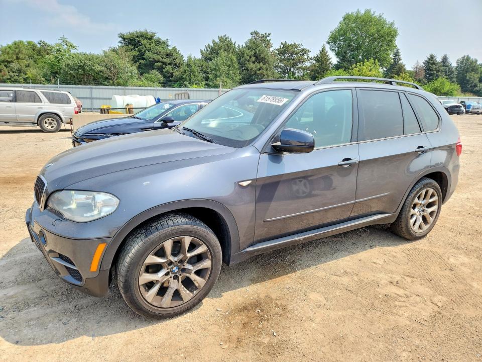 BMW X5 2013 with VIN 5UXZV4C5XD0B04364 - Photo from auction
