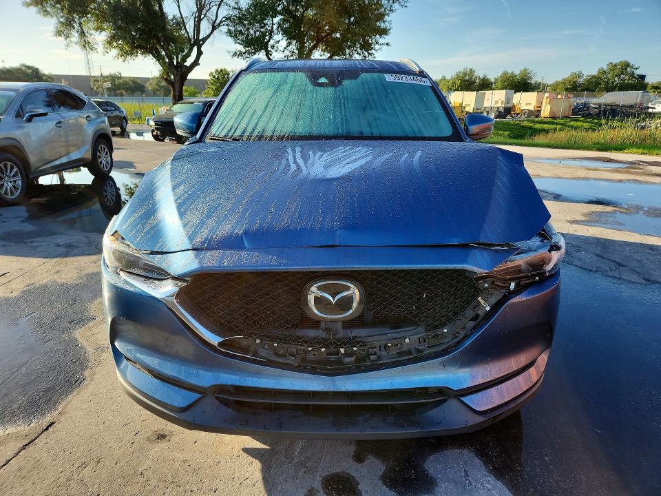 Photo 5 from auction – 2021 MAZDA CX-5 with VIN JM3KFADM0M0331622