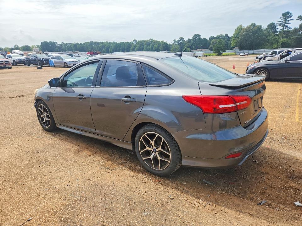 Photo 2 from auction – 2015 FORD FOCUS with VIN 1FADP3F20FL268793