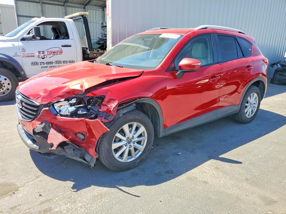 MAZDA CX-5 2016 with VIN JM3KE2CY8G0626792 - Photo from auction