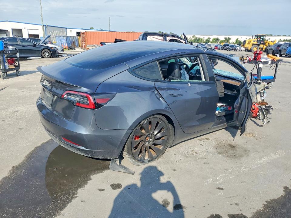 Photo 3 from auction – 2022 TESLA MODEL 3 with VIN 5YJ3E1ECXNF277514