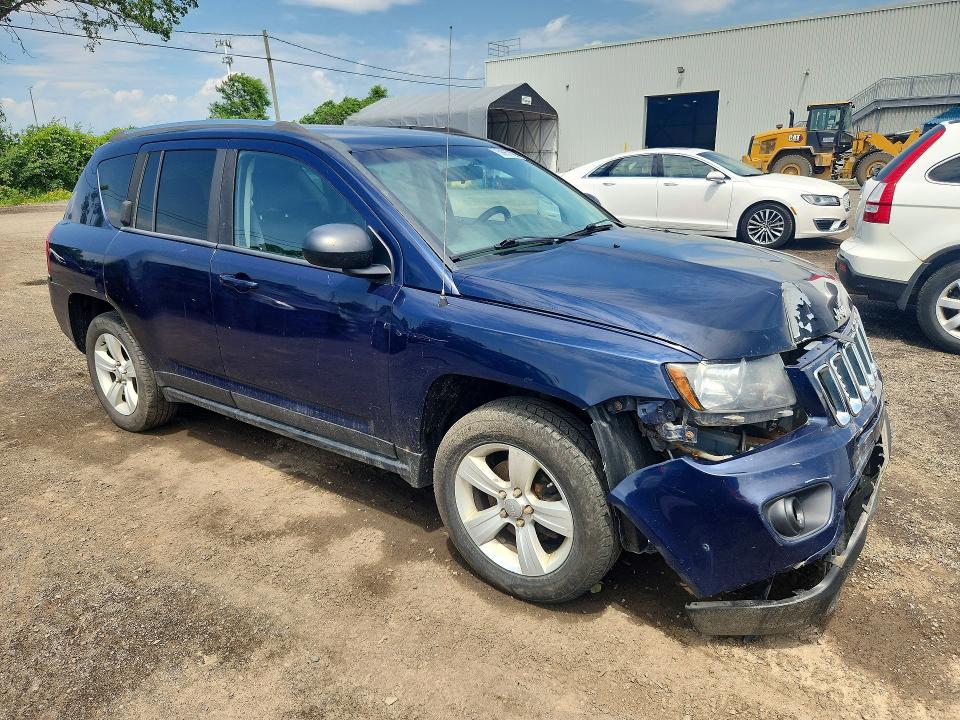 Photo 4 from auction – 2014 JEEP COMPASS with VIN 1C4NJDAB4ED566155
