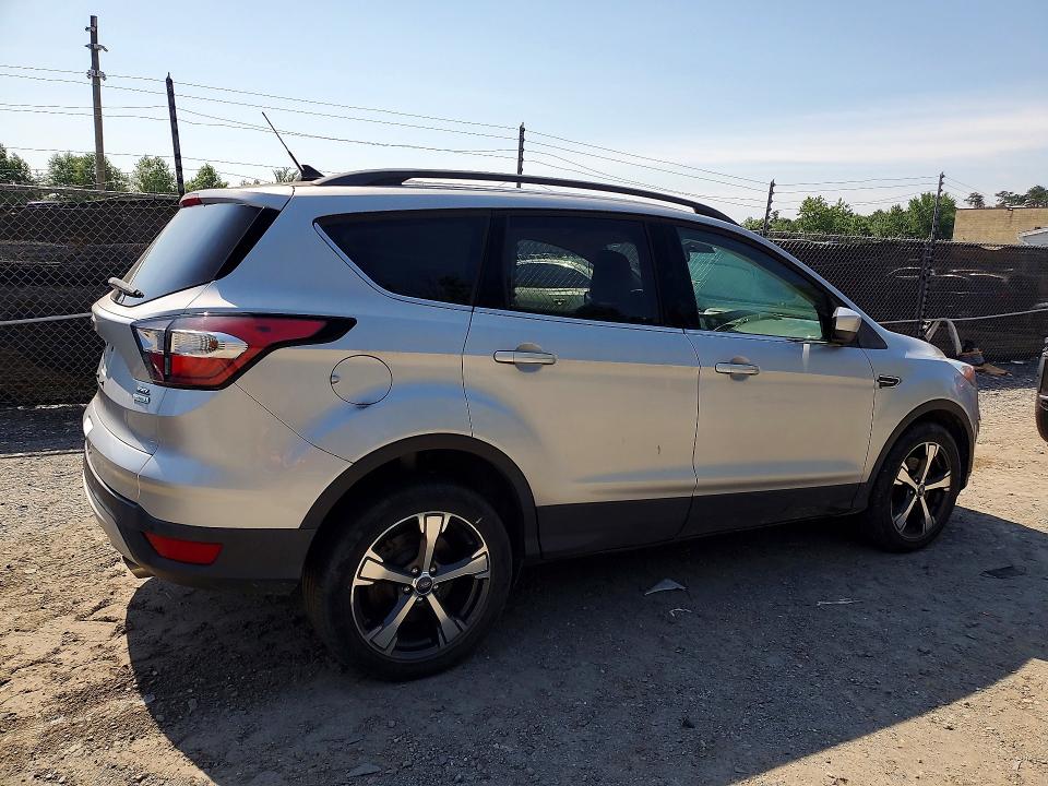 Photo 3 from auction – 2018 FORD ESCAPE with VIN 1FMCU0HD8JUD14719