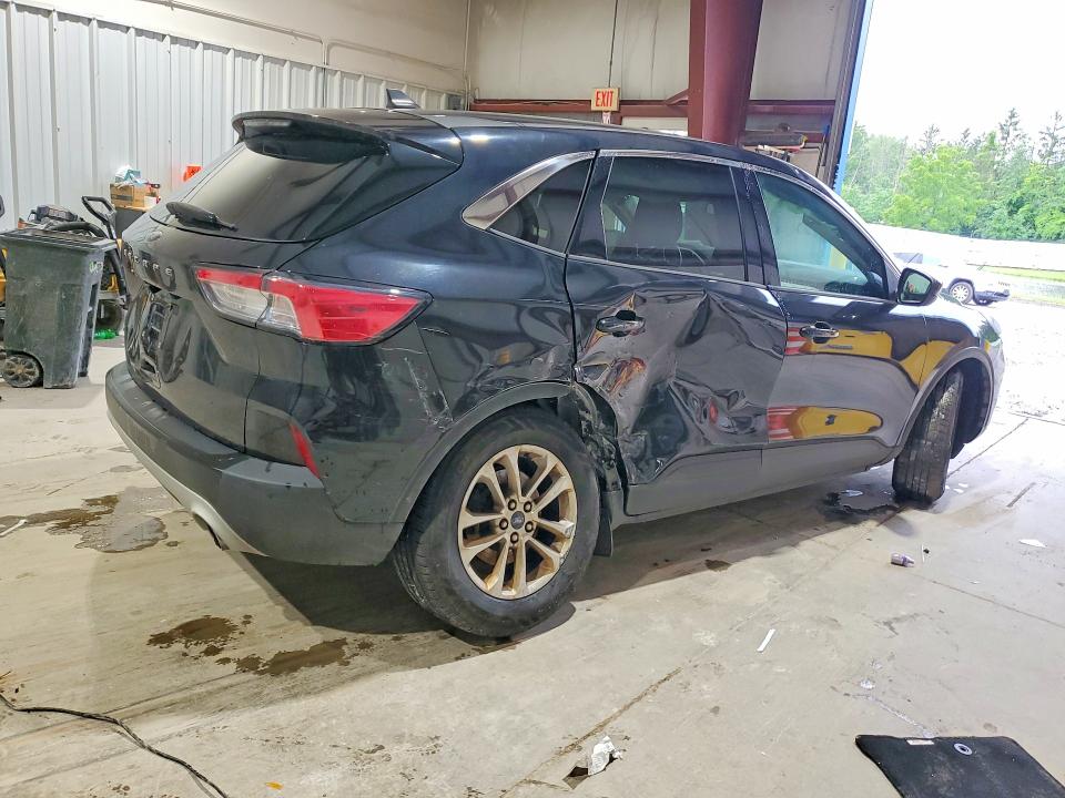 Photo 3 from auction – 2021 FORD ESCAPE with VIN 1FMCU0G60MUA20920