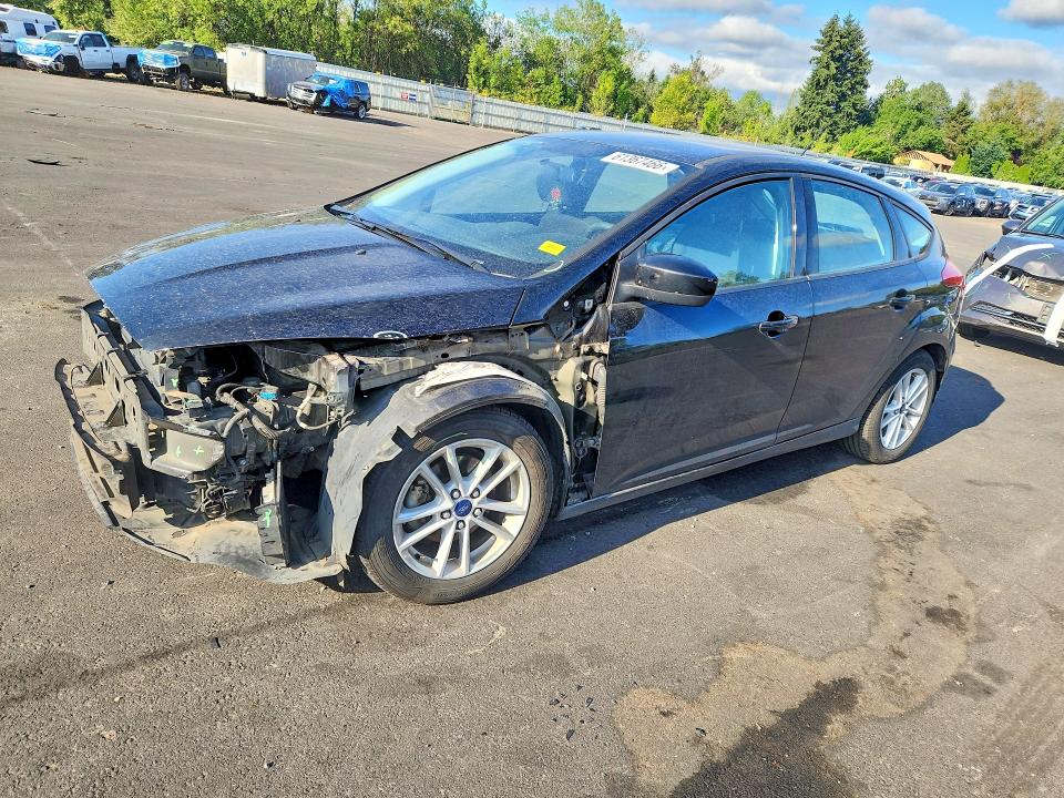 FORD FOCUS 2018 with VIN 1FADP3K28JL261055 - Photo from auction