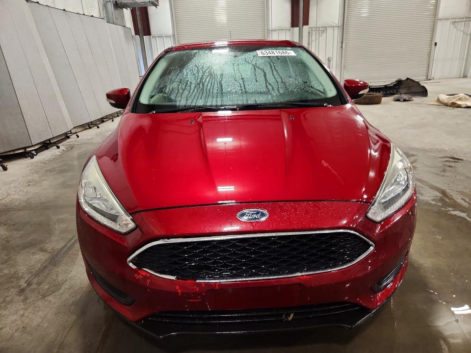Photo 5 from auction – 2015 FORD FOCUS with VIN 1FADP3K29FL232882