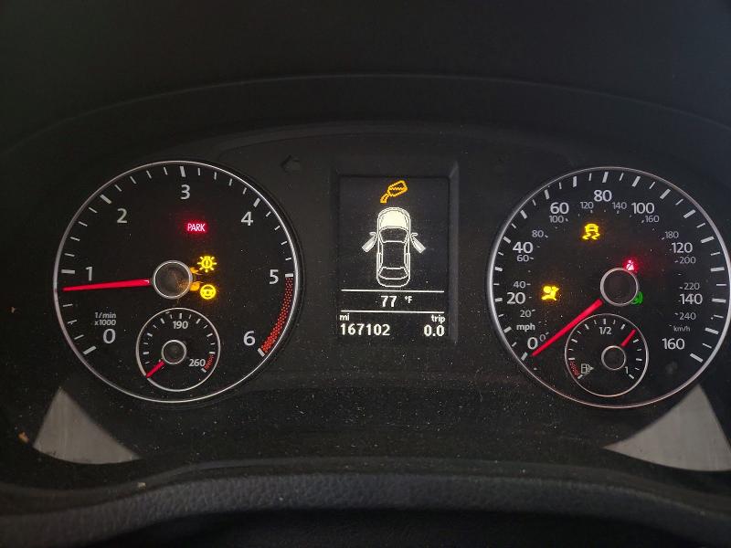 Photo 9 from auction – 2015 VOLKSWAGEN PASSAT with VIN 1VWBV7A3XFC018960