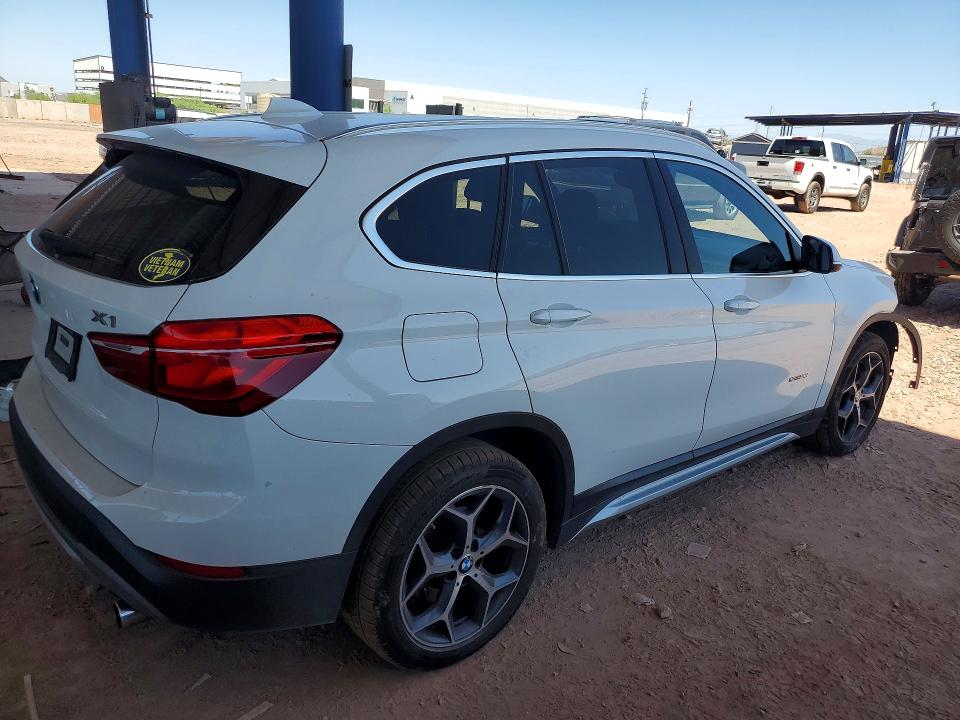 Photo 3 from auction – 2018 BMW X1 with VIN WBXHU7C37J5H45084