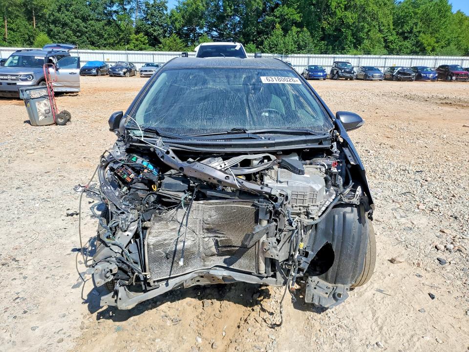 Photo 5 from auction – 2013 TOYOTA PRIUS C with VIN JTDKDTB38D1540010