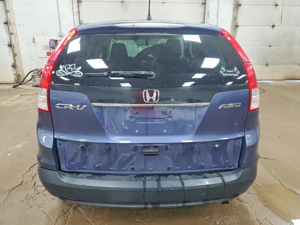 Photo 6 from auction – 2014 HONDA CR-V with VIN 2HKRM4H34EH126891