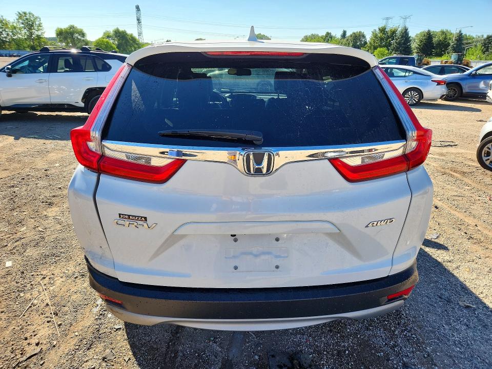 Photo 6 from auction – 2019 HONDA CR-V with VIN 2HKRW2H80KH668950