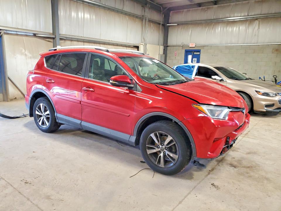 Photo 4 from auction – 2016 TOYOTA RAV4 with VIN 2T3RFREV9GW533467