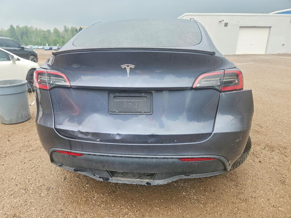 Photo 6 from auction – 2023 TESLA MODEL Y with VIN LRWYGDFD3PC019373