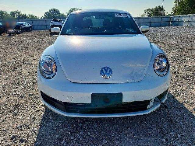 Photo 5 from auction – 2016 VOLKSWAGEN BEETLE with VIN 3VWF17AT0GM633143