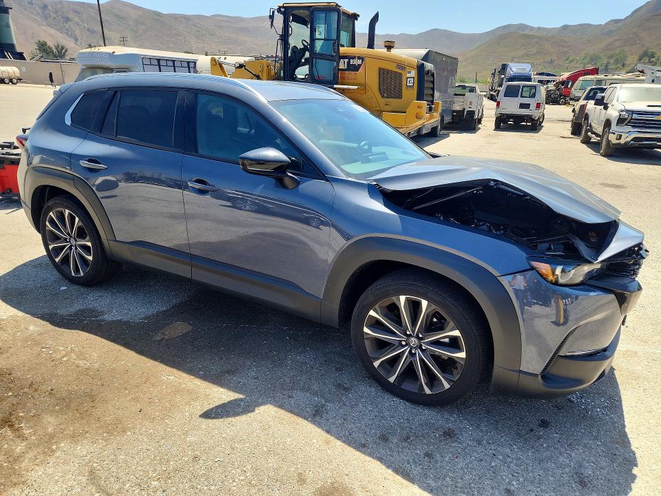 Photo 4 from auction – 2025 MAZDA CX-50 with VIN 7MMVABEM8SN318318