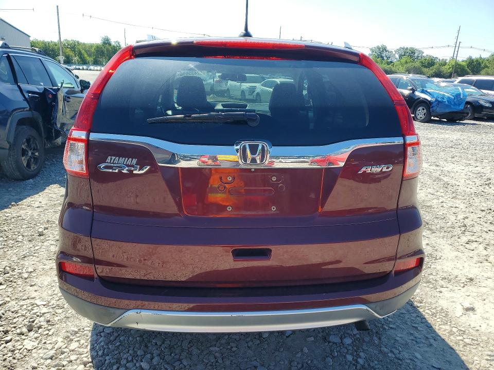 Photo 6 from auction – 2015 HONDA CR-V with VIN 2HKRM4H70FH616636