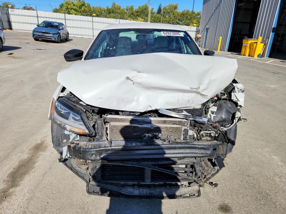 Photo 5 from auction – 2016 VOLKSWAGEN JETTA with VIN 3VWD17AJ3GM291192